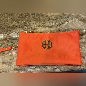 Authentuc Tory Burch Orange Wristlet Clutch with Gold Logo